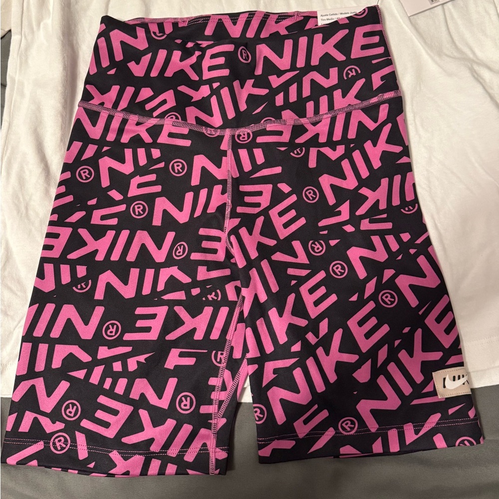 Nike Women's XS training shorts with Pink and Black Logo Pattern